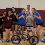 Mercer Island High School volleyball players assembled and donated six bikes as part of a team bonding activity on Aug. 25. The bikes were donated to a Mercer Island family identified through Youth and Family Services. Photos courtesy of Elise Quinn