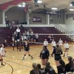 Shaun Scott/staff photo                                Mercer Island senior Tess Hendelman, left, waits patiently for the ball to land after it was hit high into the air. The Islanders captured a 3-0 victory against the Interlake Saints in the Class 3A KingCo season opening match for both teams on Sept. 6 at Mercer Island High School.