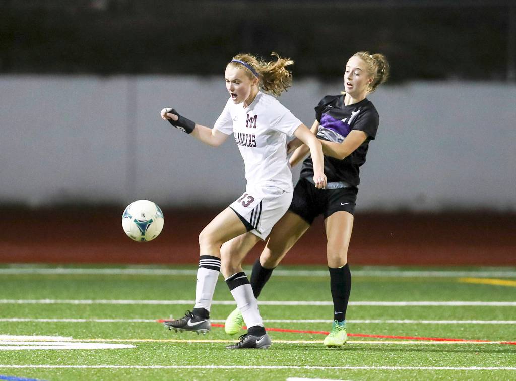 Photo courtesy of Rick Edelman/Rick Edelman Photography                                Mercer Island senior midfielder Kendall Riley controls the ball against the Lake Washington Kangaroos. Riley scored a goal on a penalty kick in the 79th minute of play. Mercer Island defeated Lake Washington 5-1.                                 Photo courtesy of Rick Edelman/Rick Edelman Photography                                Mercer Island senior midfielder Kendall Riley controls the ball against the Lake Washington Kangaroos. Riley scored a goal on a penalty kick in the 79th minute of play. Mercer Island defeated Lake Washington 5-1.