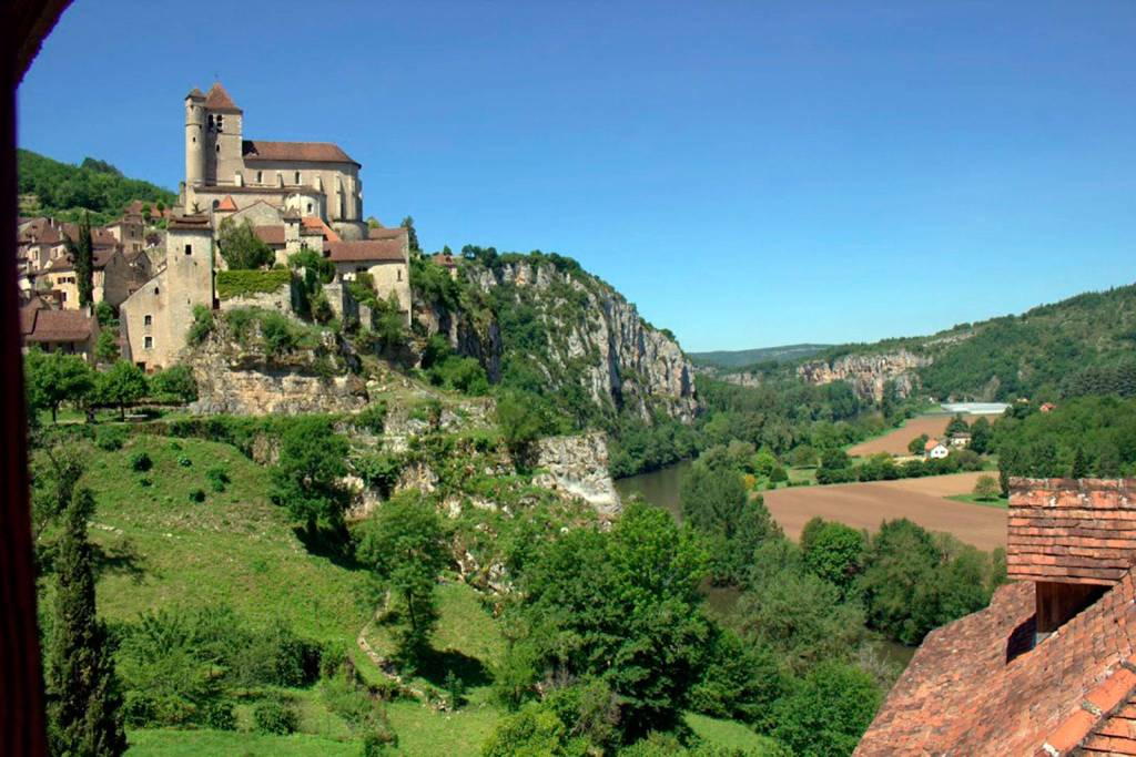 The village of St Cirq Lapopie was voted France&rsquo;s favorite village. It is &ldquo;a magical village that has been protected from the passage of time,&rdquo; according to Ann Lokey. Lokey&rsquo;s house is near a medieval gate, looking up at the village and down on the Lot river. Photo courtesy of David Wagner