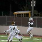 Photo courtesy of Don Borin/Stop Action Photography                                Mercer Island wide receiver Cole Miller hauls in a 73-yard reception from quarterback Nikhil Nayar in the second quarter of play. Bellevue defeated Mercer Island 40-7 on Oct. 13.