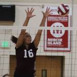 Photo courtesy of Don Borin/Stop Action Photography                                Mercer Island senior Adara Hamilton makes a key block in a contest earlier this season against the Liberty Patriots this past September. The Islanders swept the Lake Washington Kangaroos 3-0 (25-15, 25-9, 25-12) on Oct. 18 on senior night.