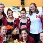 Mercer Island girls swim team seniors Tess Ritcey, Lauren Ralph, Caroline Harkins, Landon Cobbs, Kathryn Ristuben, Taylor Winnie, Ellie Williams and Haley Crowther gathered for a picture before the Islanders competed against the Sammamish Totems on senior night, Oct. 12. Photo courtesy of Allison Needles