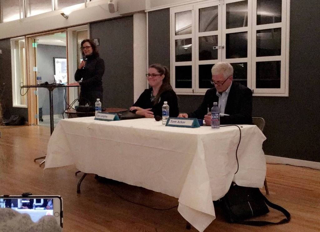 Moderator Orna Samuelly asks forum attendees to line up to ask questions of council candidates Joy Langley and Tom Acker. They were asked about taxes, growth and their leadership styles, among other topics. Katie Metzger/staff photo