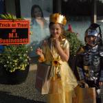 Kite and Cal Robinson, ages 7 and 6, trick or treat in Islandia Center on Halloween. Katie Metzger/staff photo