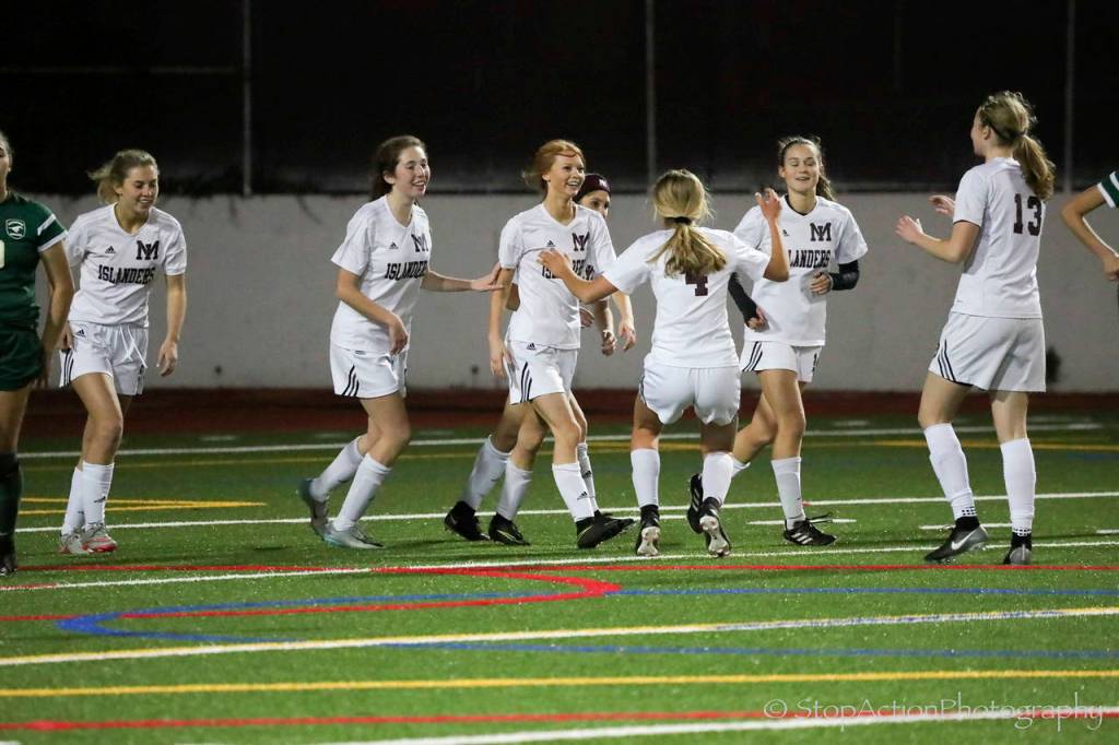 Photo courtesy of Don Borin/Stop Action Photography                                The Mercer Island Islanders earned a 3-0 win against the Redmond Mustangs in the Class 3A KingCo championship game on Oct. 31 at Mercer Island High School. The victory in the KingCo 3A title game clinched the Islanders a berth in the Class 3A state tournament. Mercer Island midfielder Jessie Stenberg scored two goals in the win. Islanders&rsquo; junior midfielder Jackie Gilroy added a goal as well.
