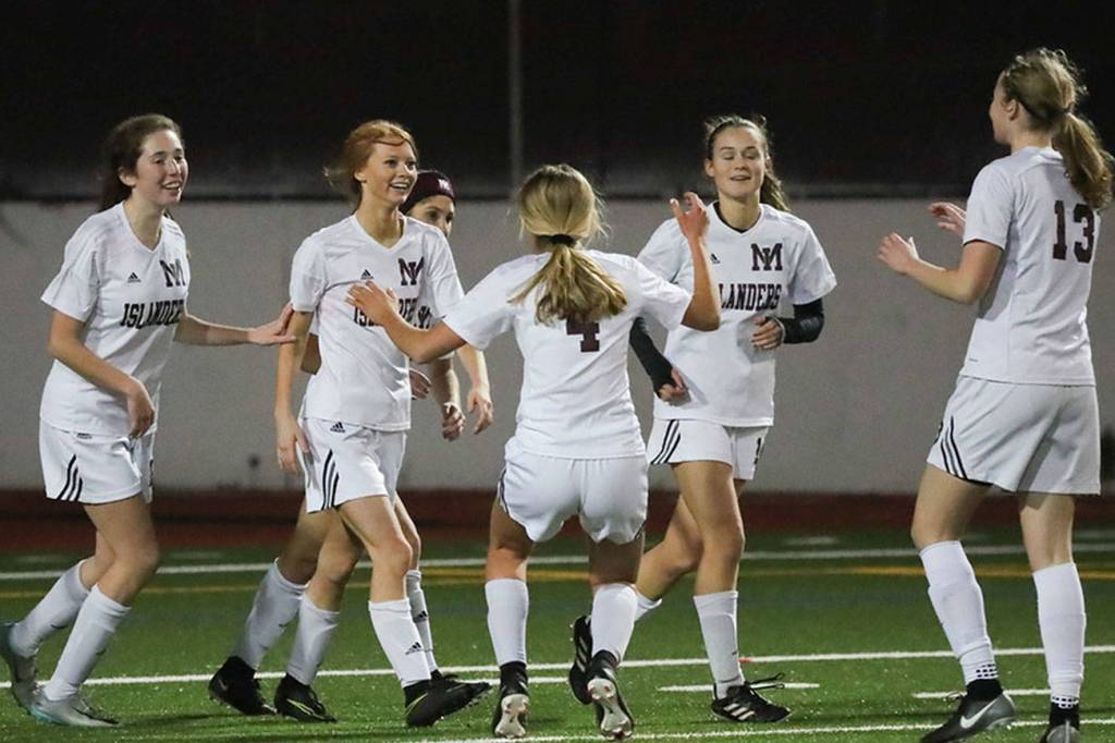 Photo courtesy of Don Borin/Stop Action Photography                                The Mercer Island Islanders earned a 3-0 win against the Redmond Mustangs in the Class 3A KingCo championship game on Oct. 31 at Mercer Island High School. The victory in the KingCo 3A title game clinched the Islanders a berth in the Class 3A state tournament. Mercer Island midfielder Jessie Stenberg scored two goals in the win. Islanders&rsquo; junior midfielder Jackie Gilroy added a goal as well.