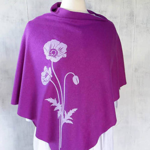Seattle artist Shino Mikamis eco-friendly womens poncho made of hemp/organic cotton jersey displays a picture of poppy flowers screen-printed on the front. Courtesy of the artist