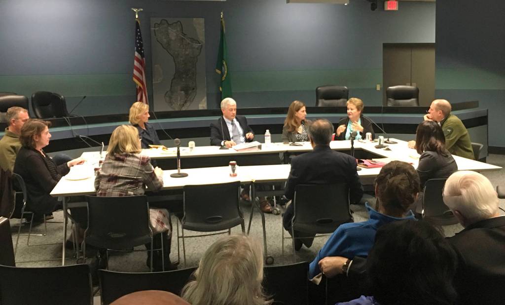 State representatives Tana Senn and Judy Clibborn discuss legislative priorities with members of the Mercer Island City Council, including recently sworn in Tom Acker. Katie Metzger/staff photo