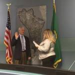 Acker is sworn in by City Clerk Ali Spietz on Nov. 28. Photo courtesy of Traci Granbois
