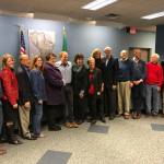Many of the people Dan Grausz shared time with on the city council, along with many other community members, honored his service to Mercer Island on Dec. 5. Photo courtesy of David DSouza