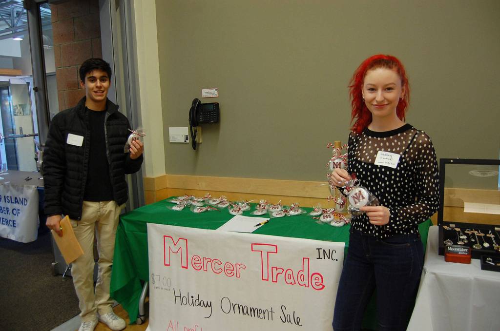 Students from the MIHS Social Enterprise Group sell holiday ornaments. Katie Metzger/staff photo