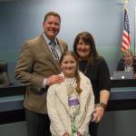 New School Board member Brian Giannini Upton poses with his family during a reception at the Dec. 14 meeting. Katie Metzger/staff photo