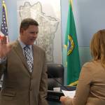 Superintendent Donna Colosky swears Brian Giannini Upton into Position 2 on the Mercer Island School Board on Dec. 14. Katie Metzger/staff photo