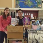 Mercer Island High School collected items to benefit 35 families identified through the Mercer Island Youth and Family Services Foundation. Students were busy on Dec. 6, moving the food into the commons. Photo courtesy of the Mercer Island School District