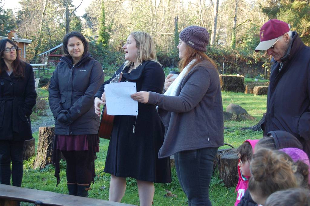 The peace pole installation ceremony at the SJCC featured songs and speeches. Katie Metzger/staff photo