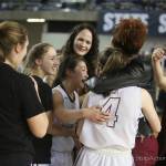 Photo courtesy of Don Borin/Stop Action Photography                                The Mercer Island Islanders basketball team celebrates after defeating the Bishop Blanchet Braves 52-47 in the Class 3A girls state championship game on March 4 at the Tacoma Dome.
