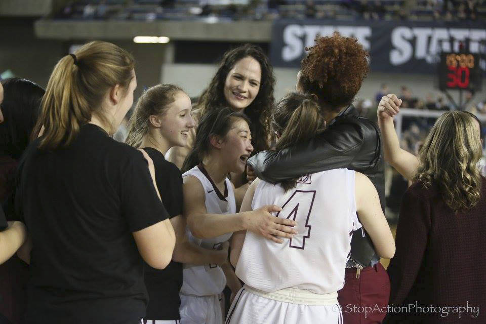 Photo courtesy of Don Borin/Stop Action Photography                                The Mercer Island Islanders basketball team celebrates after defeating the Bishop Blanchet Braves 52-47 in the Class 3A girls state championship game on March 4 at the Tacoma Dome.