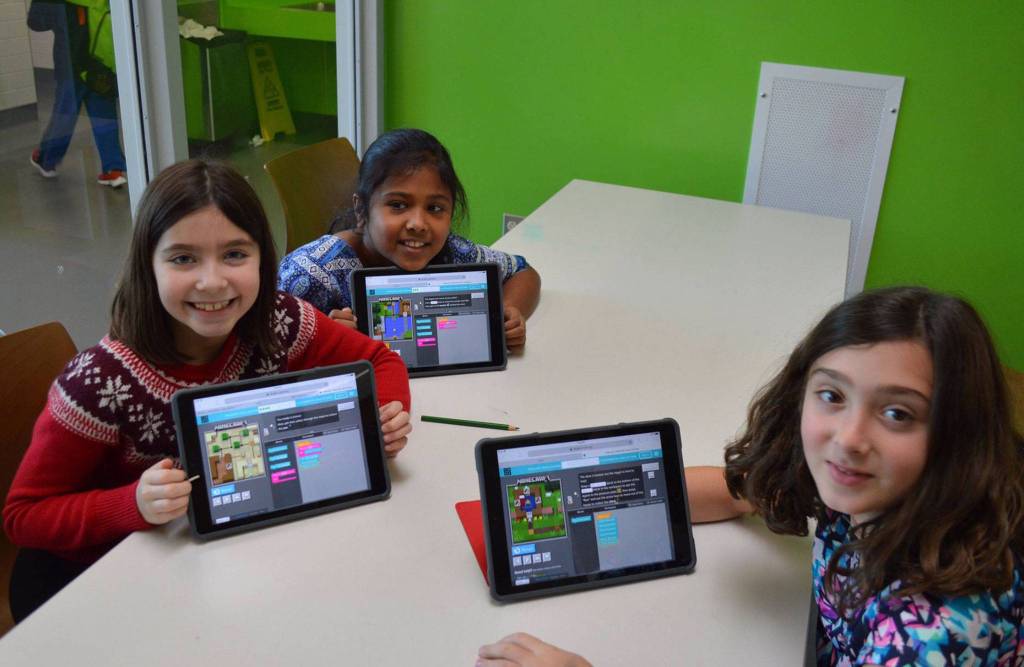 Mercer Island students show off their Minecraft-themed coding projects. Photo courtesy of the Mercer Island School District