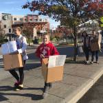 Girl Scouts drop donation boxes off at Mercer Island businesses, to help fulfill their goal of donating 100 bags of care to homeless people over the holidays. Photo courtesy of Terese Broccoli