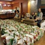 Scouts pose with their bags of care. Photo courtesy of Terese Broccoli