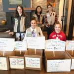 Members of Girl Scout Troop 44297 asked the community for donations to help them make care packages for homeless people. Photo courtesy of Terese Broccoli