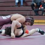 Photo courtesy of Billy Pruchno                                The Mercer Island Islanders wrestling squad cruised to a 48-0 victory against the Sammamish Totems on Jan. 5. Mercer Island 126-pounder Jordan Tillinger (pictured) pinned his opponent in the third round. Eli Pruchno (138), Vinny Ricci (152), and Rina Li (120) registered pins in their respective matches. Jonah Andrews (160), Liam Farrell (170), Donnie Howard (182) and Owen Babeler (195) won by forfeit.