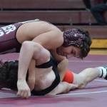 Photo courtesy of Billy Pruchno                                The Mercer Island Islanders wrestling squad cruised to a 48-0 victory against the Sammamish Totems on Jan. 5. Mercer Island 126-pounder Jordan Tillinger (pictured) pinned his opponent in the third round. Eli Pruchno (138), Vinny Ricci (152), and Rina Li (120) registered pins in their respective matches. Jonah Andrews (160), Liam Farrell (170), Donnie Howard (182) and Owen Babeler (195) won by forfeit.