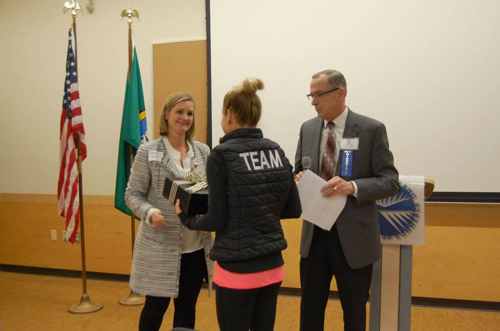 The chambers Laurie Givan and Ralph Swanson announced MI Athletic Club as the business of the year award winner at the January luncheon. Katie Metzger/staff photo