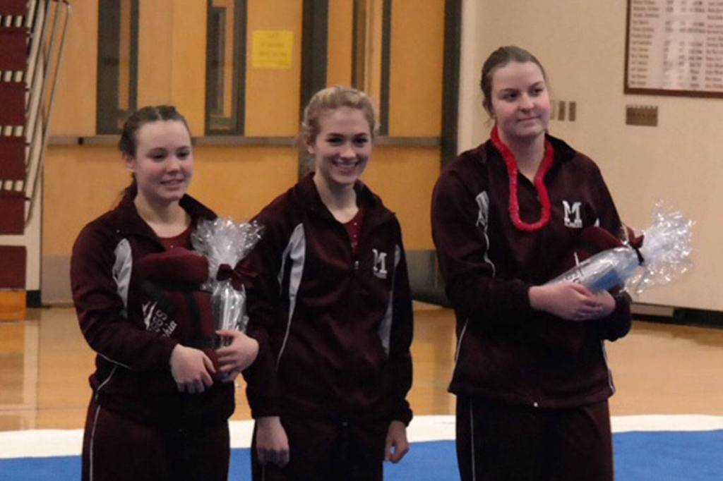 Photo courtesy of Martha Phelps                                The Mercer Island gymnastics squad captured a 155-146 victory against the Liberty Patriots on Jan. 18 on senior night at Mercer Island High School. Mercer Island improved its overall record to 4-2 with the win. Ava Motroni earned second place in All-Around. Junior Kaela Fukano nabbed second place on Bars. Islanders seniors Sophia Tiscornia, Leah Wooton and Tess Ritcey are pictured in the photo.