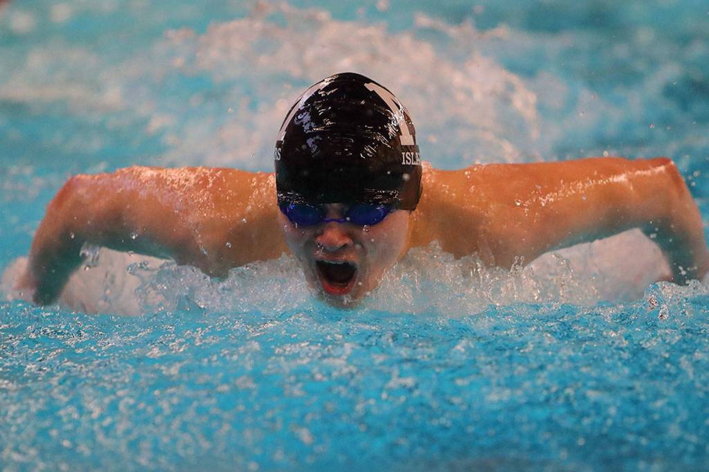 Photo courtesy of Jay Na                                The Mercer Island Islanders cruised to a 115-61 win against the Bellevue Wolverines in the regular season finale on Jan. 25. James Richardson (pictured) earned first place in the 100 fly. Mercer Island improved their overall record to 7-0 in dual meets with the win. Mercer Island head coach Evan Moline is looking forward to the postseason in the pool.                                Our undefeated season has been great and it shows the true depth that we have on this team. We havent gone undefeated in the regular season in a few years now but we definitely arent done, Moline said. We know we have some work to do, but we are still focused on what we set out for this year, which is a state championship. We want to bring back the culture of success that I was lucky enough to experience back when I was on the team.                                The 200 medley relay quartet of Alex Edwards, Kyle Bailey, Carson Coe and Richardson captured first place. The 200 free relay team of Killian Riley, Nate Robinson, Oliver Hoff and Coe cruised to a first place finish. The 400 free relay team of Riley, Richardson, Robinson and Hoff earned first place. Islanders capturing first place in individual events were Colin Ralston (200 IM, 100 breast stroke), Jake Headrick (500 free) and Richardson (100 backstroke).