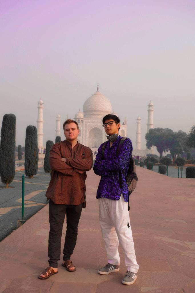 Brett Bottomley and Stuart Toda (MIHS 15) pose outside the Taj Mahal in Agra, India. Last fall, they spent a month apiece in Russia, China and India while enrolled in a unique study abroad course. Photo courtesy of Brett Bottomley