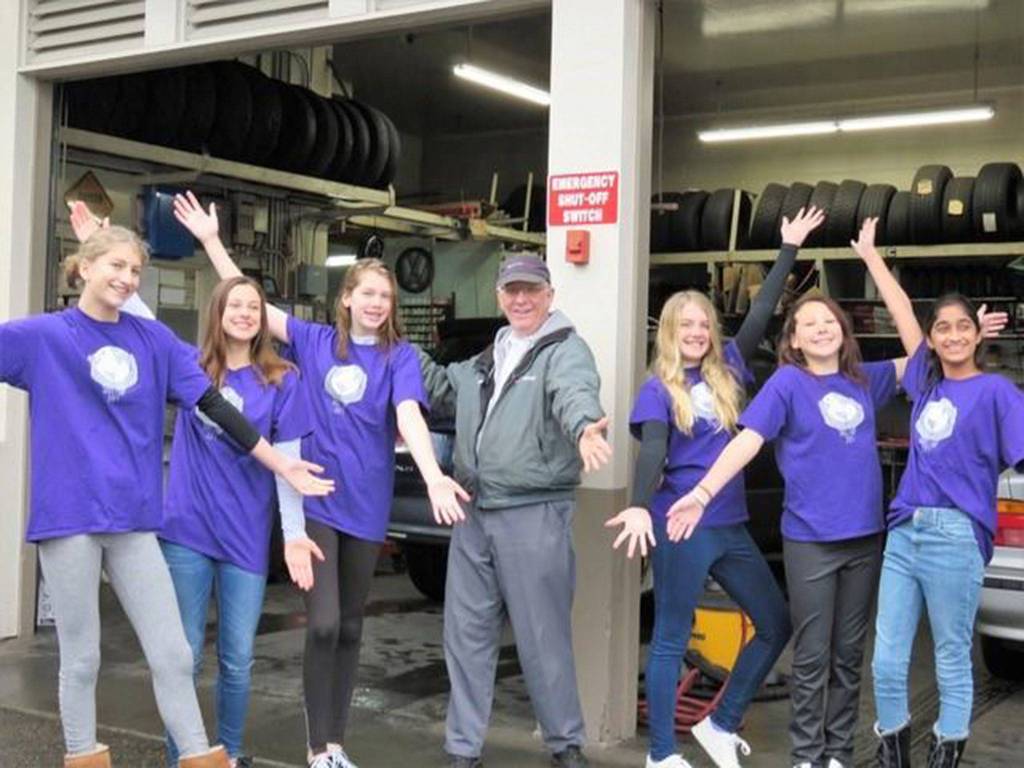Volunteers smile outside Petes South Mercer Chevron, which will donate 10 percent of proceeds on Feb. 7-8 to MIYFS. Photo courtesy of MIYFS Foundation