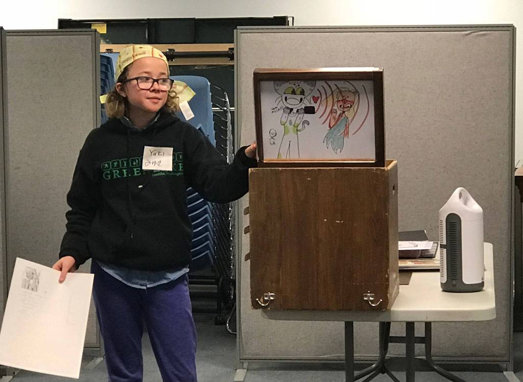 YTN youth learn the art of Kamishibai, a form of traditional street theatre and storytelling. Photo courtesy of Manny Cawaling