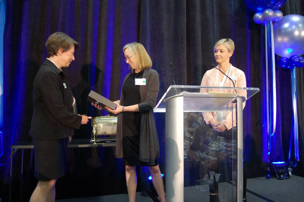 MIYFS Director Cindy Goodwin and MIYFS Foundation Board President Pam Hinnen present Kara McCulloch with the Community Philanthropy Award on Feb. 7. Katie Metzger/staff photo