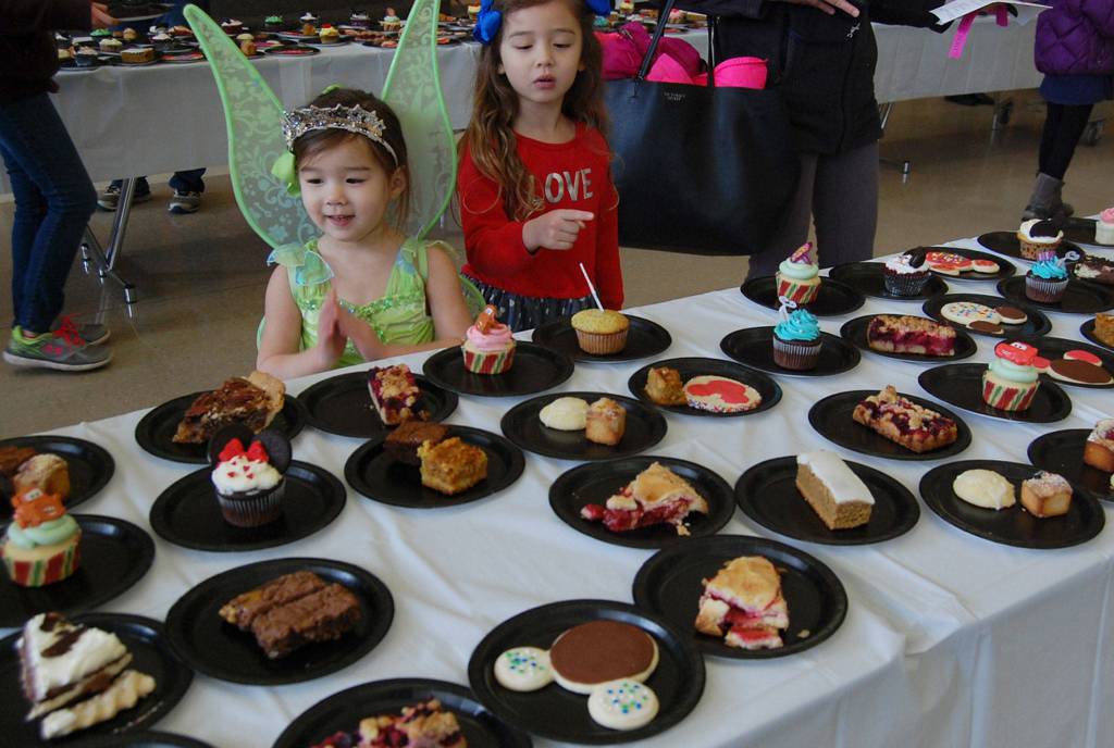 Young Islanders dressed in Disney costumes admire the dessert display. Katie Metzger/staff photo