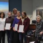 From left, Councilmember Wendy Weiker, President/CEO of Boys and Girls Clubs of King County Dr. Lisa Chin, co-President of the MIHS Gender Equality Club Dana Berejka, Mayor Debbie Bertlin, past President of the League of Women Voters of Seattle-King County Amanda Clark, Gender Equality Club co-president Julia Graham, community volunteer Myra Lupton and City Manager Julie Underwood pose with copies of the proclamation. Katie Metzger/staff photo