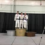 Photo courtesy of Mark Yuasa                                Mercer Island Islanders freshman Tegan Yuasa, center, earned first place in the Cadet -50 kilogram division at the USA Judo Scholastic National Championships on March 3-4 in York, Pennsylvania. Yuasa will also represent Team USA at the 2018 Cadet Pan American Championships on July 6, 2018 in Buenos Aires, Argentina.