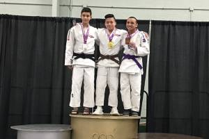 Photo courtesy of Mark Yuasa                                Mercer Island Islanders freshman Tegan Yuasa, center, earned first place in the Cadet -50 kilogram division at the USA Judo Scholastic National Championships on March 3-4 in York, Pennsylvania. Yuasa will also represent Team USA at the 2018 Cadet Pan American Championships on July 6, 2018 in Buenos Aires, Argentina.
