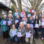 Mercer Island Guild members smile after their Directory Mailing Day in 2017. Courtesy photo