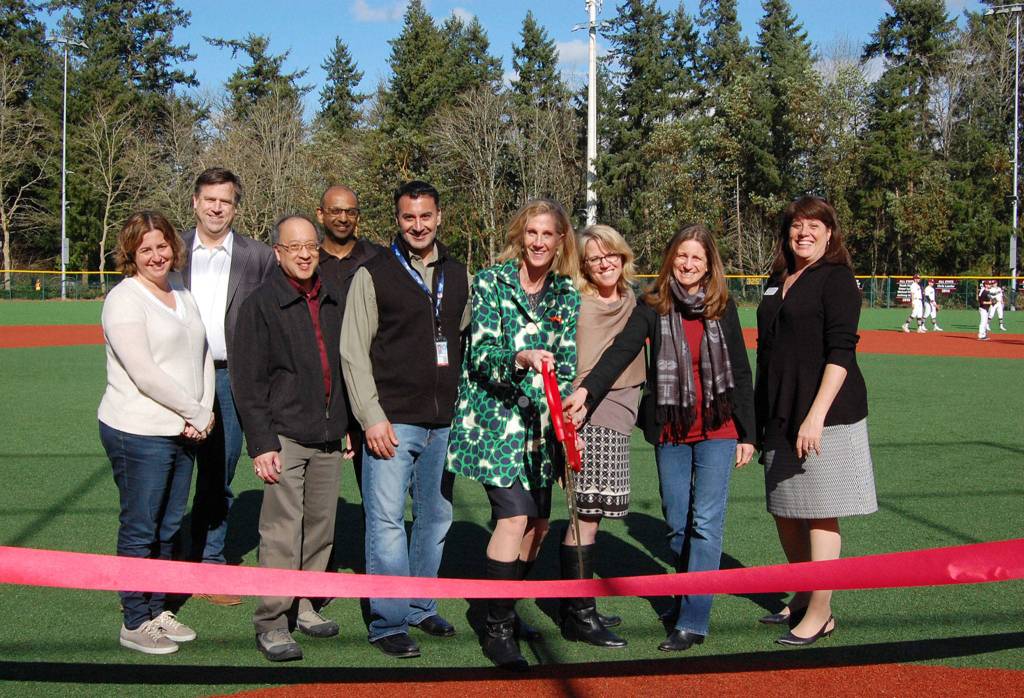 Members of the Mercer Island City Council and School Board welcome the community to the renovated park. Katie Metzger/staff photo