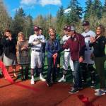 Mercer Island baseball players, boosters and elected officials cut the ribbon on the north field of Island Crest Park before the first varsity home game on March 14. Katie Metzger/staff photo