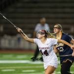 Photo courtesy of Rick Edelman/Rick Edelman Photography                                The Mercer Island Islanders girls lacrosse team cruised to a 16-3 win against the Bellevue Wolverines on March 21 in Mercer Island. Grace Fujinaga scored a game-high six goals for the Islanders in the win. Katie Brodsky and Tessa Guerra chipped in three goals apiece as well. Mercer Island improved their overall record to 4-0 with the win. Brodksy (pictured) controls possession of the ball against the Wolverines.
