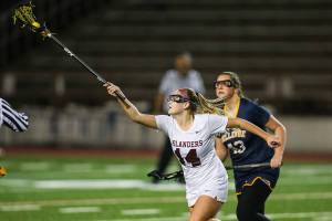 Photo courtesy of Rick Edelman/Rick Edelman Photography                                The Mercer Island Islanders girls lacrosse team cruised to a 16-3 win against the Bellevue Wolverines on March 21 in Mercer Island. Grace Fujinaga scored a game-high six goals for the Islanders in the win. Katie Brodsky and Tessa Guerra chipped in three goals apiece as well. Mercer Island improved their overall record to 4-0 with the win. Brodksy (pictured) controls possession of the ball against the Wolverines.