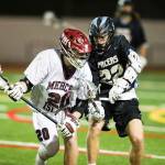 Photo courtesy of Rick Edelman/Rick Edelman Photography                                The Mercer Island Islanders boys lacrosse team earned their fifth win of the 2018 season courtesy of a 14-5 victory against Lakeridge on March 23. Mercer Island player Donnie Howard (pictured) controls the ball while being defended by a Lakeridge player.