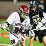 Photo courtesy of Rick Edelman/Rick Edelman Photography                                The Mercer Island Islanders boys lacrosse team earned their fifth win of the 2018 season courtesy of a 14-5 victory against Lakeridge on March 23. Mercer Island player Donnie Howard (pictured) controls the ball while being defended by a Lakeridge player.