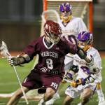 Photo courtesy of Rick Edelman/Rick Edelman Photography                                The Mercer Island Islanders boys lacrosse team registered a 12-5 victory against the Issaquah Eagles on March 30 at Gary Moore Stadium in Issaquah. The Islanders improved their overall record to 7-1 with the win. Islanders junior Ben Dunbar (pictured) carried the ball down the field against the Eagles.