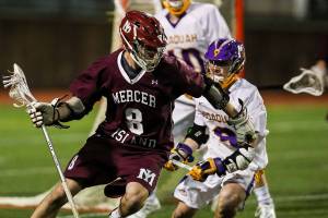 Photo courtesy of Rick Edelman/Rick Edelman Photography                                The Mercer Island Islanders boys lacrosse team registered a 12-5 victory against the Issaquah Eagles on March 30 at Gary Moore Stadium in Issaquah. The Islanders improved their overall record to 7-1 with the win. Islanders junior Ben Dunbar (pictured) carried the ball down the field against the Eagles.