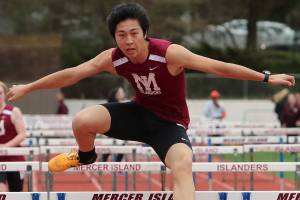 Photo courtesy of Jay Na                                The Mercer Island Islanders girls track team improved their overall record to 4-0 courtesy of a 89-56 win against Interlake and a 91-58 victory against the Redmond Mustangs in a KingCo 3A/2A double dual on March 29 on Mercer Island.                                The Mercer Island boys squad lost to Interlake 76-69 and were defeated by Redmond 98-57. Islanders girls athletes capturing first place in their respective events consisted of Maya Virdell (100 meters, 1600 meter-relay), Gretchen Blohm (200 meters, 800 meter-relay), Kayla Lee (400 meters, 800 meter-relay, 1600 meter-relay), Katie McCormick (100 meter hurdles), Ella Hensey (800 meter-relay, 1600 meter-relay), Eliza Crenshaw (800 meter-relay), Margaret Baker (1600 meter-relay), Faith Osei-Tutu (shot-put, javelin) and Susanna Lepow (pole vault). Islanders boys athletes earning first place in their events were Colin Farrell (100 meters, 200 meters), Jack Clayville (110 hurdles), Mitchell Kirby (300 hurdles), Eli Yen (discus) and Jeffery Tian (pole vault). Yian (pictured) competes in the 110 hurdles in a double dual against the Interlake Saints and Redmond Mustangs on March 29.