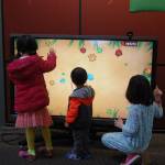 Leap for Green offers many interactive activities for kids, including arts and crafts, games and story time with the Mercer Island Library. Katie Metzger/staff photo